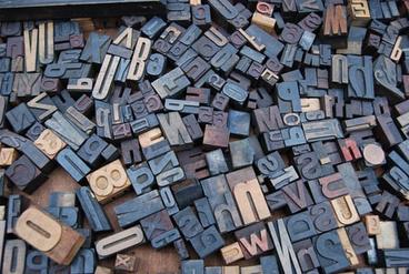 Assortment of random pile of wood letter steps.
