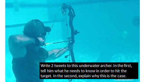 Man shooting archery underwater in pool