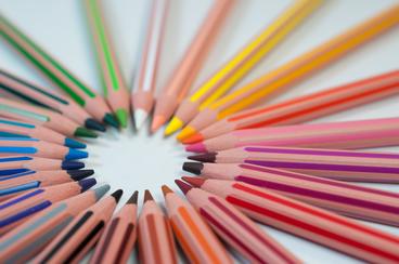 Colored pencils layed out in a circular design